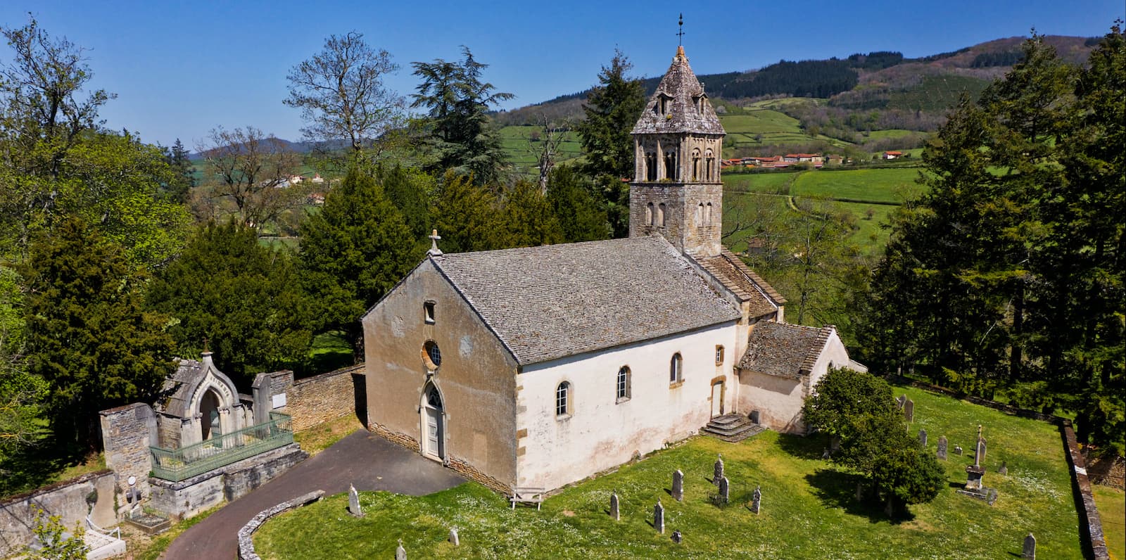 The roman church and tomb of Lamartine, next to the castle of Saint-Point